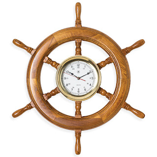 https://bellclocks.com/collections/bey-berk-international/products/oak-ships-wheel-brass-clock-bey-berk-sq514