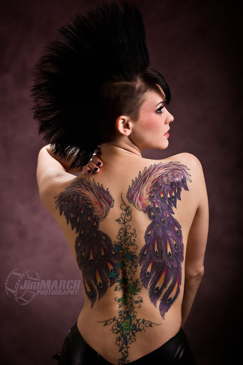 A Woman with Wing Celtic Tattoos and Mohawk Hairstyle Tattoo Designs and