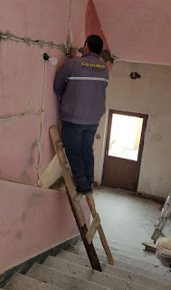 Bekir on his ladder, after falling off it