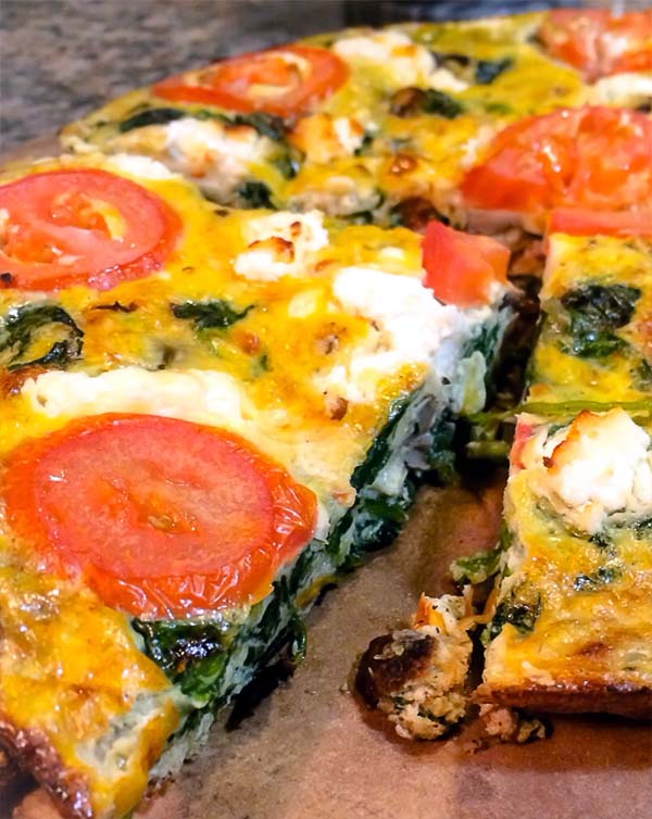 Take a cheese and spinach frittata. Add tomato slices and mushrooms. Yum!