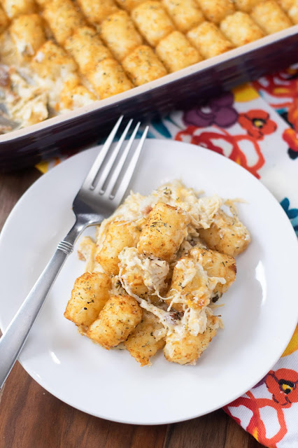 A plate with the finished bacon chicken ranch tater-tot casserole on it. 