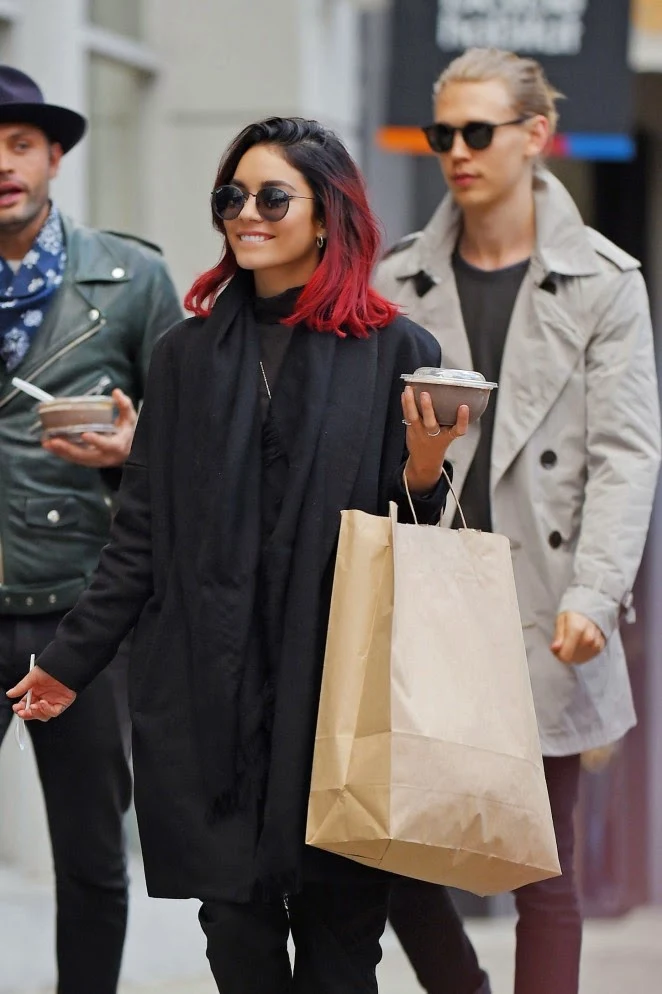 Vanessa Hudgens flaunts red hair and an all black outfit out and about in Soho