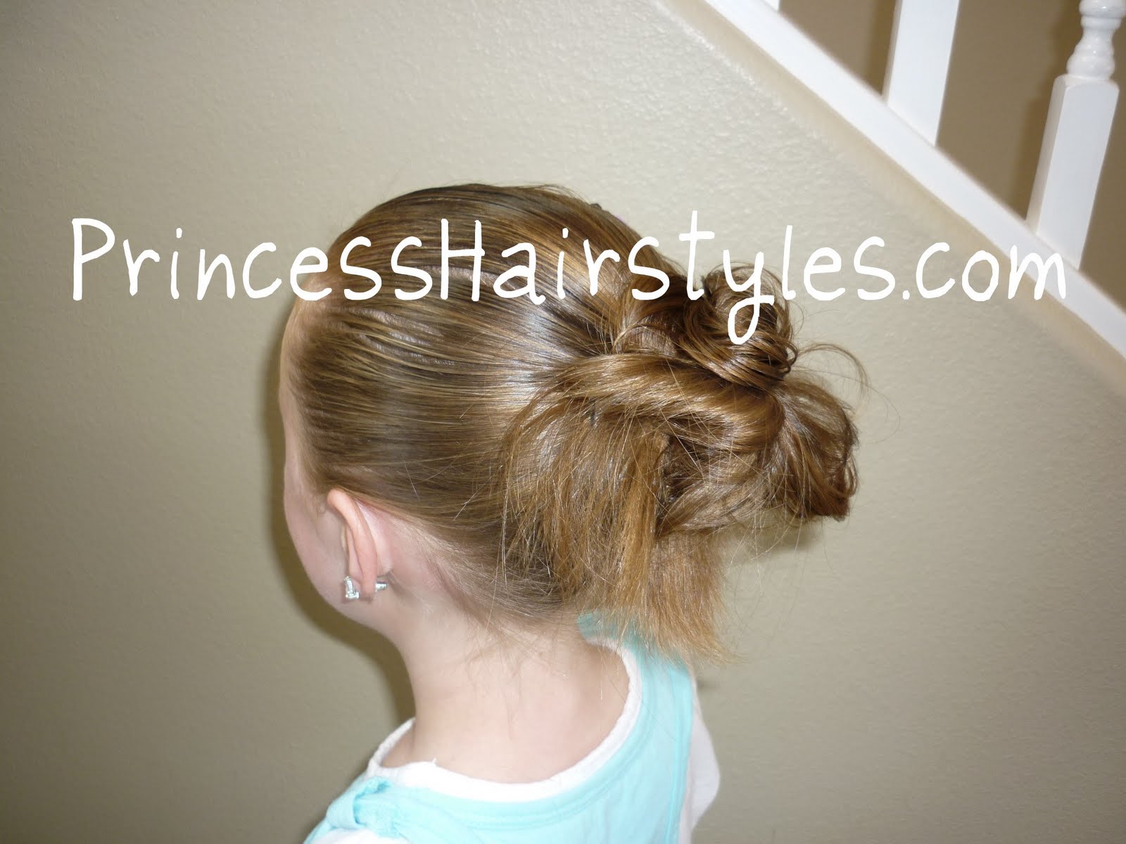 Image of Messy bun hairstyle for 6-year-olds