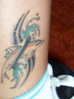 dolphin tattoos. tribal dolphin tattoos