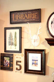 gallery wall with antlers and wooden number via www.goldenboysandme.com