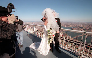 A wedding takes place at the top of the World Trade Center