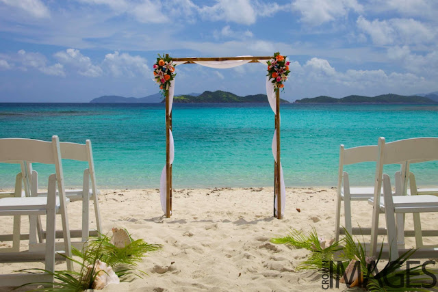 candle lanterns beach wedding aisle