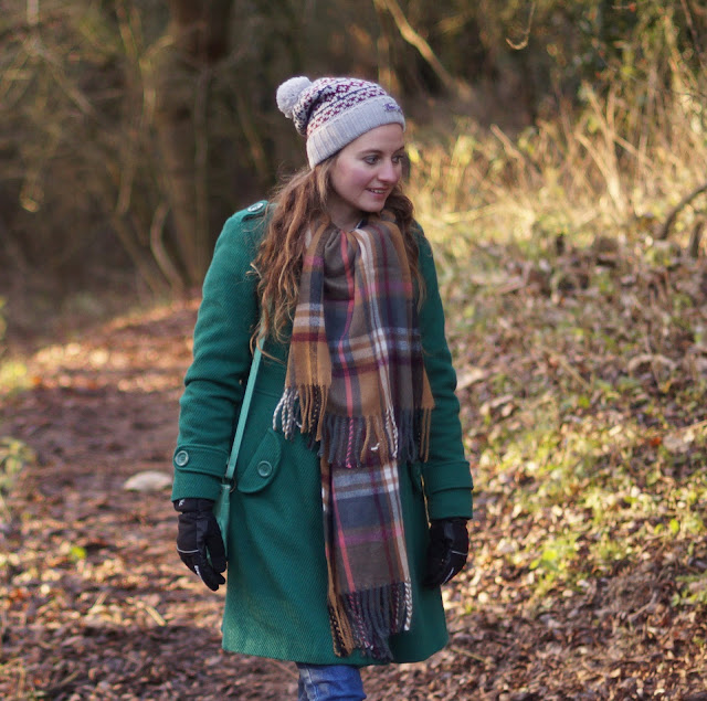 wearing a hat and scarf in winter