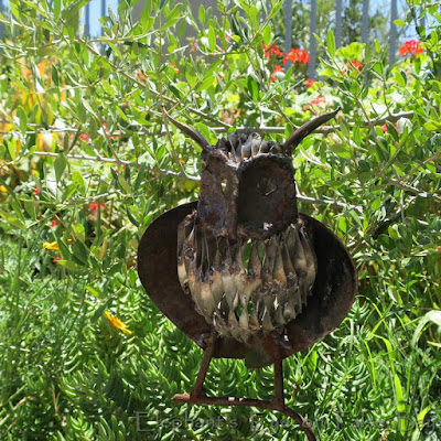 Metal owl garden art