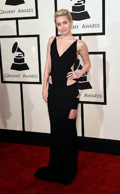 Miley Cyrus sexy in cut-out dress by Alex Vauthier gown at 2015 Grammy Awards red carpet