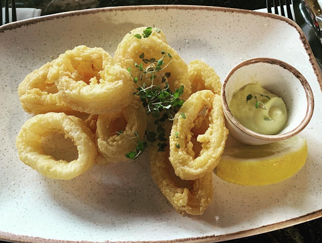 calamari rings, topped with micro-cress with an aioli dip