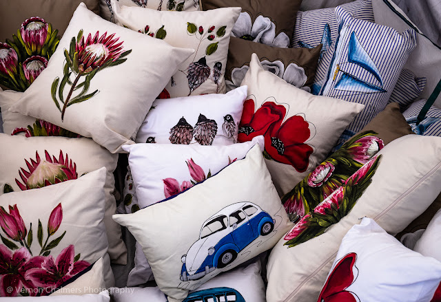 Vibrant and comfy hand painted pillows with boats, cars and flowers