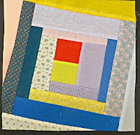 http://joysjotsshots.blogspot.com/2014/02/quilt-shot-block-17-wonky-log-cabin.html