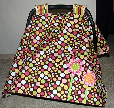 Have you seen those really cute car seat blanket/tent/canopy/whatever you 