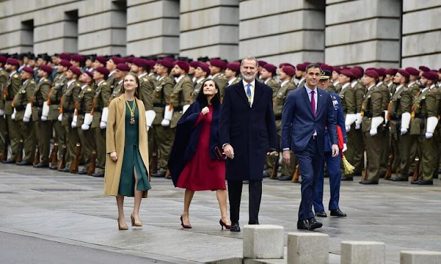 Princess Leonor wore a green a-line dress by Adolfo Dominguez, and camel double-faced wool coat by Carolina Herrera