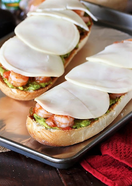 Topping Guacamole Shrimp Melts with Cheese Image