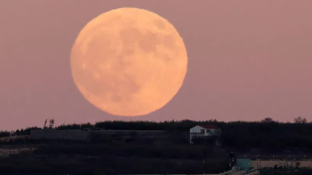 The supermoon rises over the Israeli-occupied Golan Heights