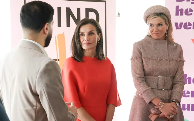 Queen Letizia wore a pink coral dress and pink coat by Carolina Herrera. Queen Maxima wore a tweed jacket by Claes Iversen