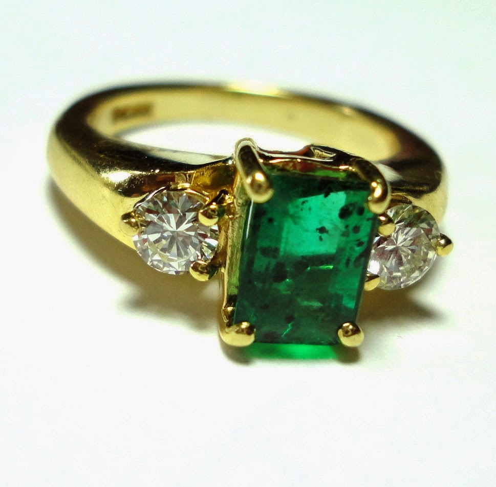 wedding ring green gem