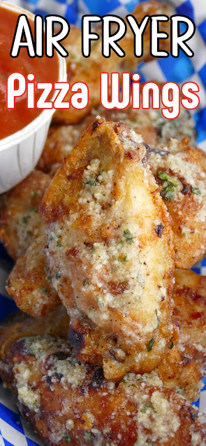 Air Fryer Parmesan Pizza Wings piled in a basket with a recipe title text overlay..