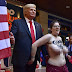 Topless female activist grabs Donald Trump’s waxwork by the balls (Photos)