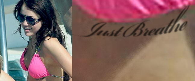 We already know that she has "Just Breathe" as a tattoo under her breast and 