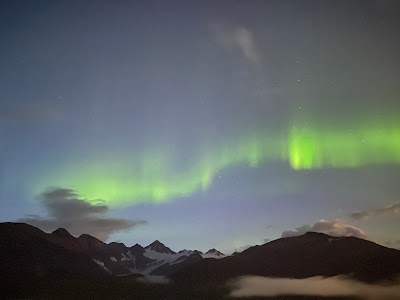 Northern Lights over mountains in Whittier Alaska