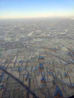 Shadows cast over frosty fields