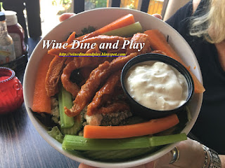 The Buffalo chicken salad has blue cheese, celery and carrot batons and more at The Three Birds Tavern in St. Petersburg, Florida.