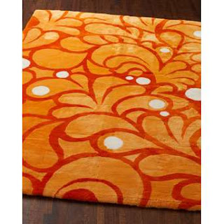 area rugs in orange