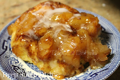 Buttery biscuits baked in apple pie filling with brown sugar, cinnamon and extra apple pie spices, finished with a powdered sugar glaze, make for a belly-warming sweet treat.