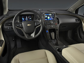 Black interior of 2012 Chevrolet Volt featuring digital gauge cluster and multi-function display screen