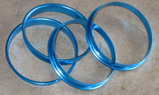 When bigger center bore for the after market rims use this hubcentric rings.