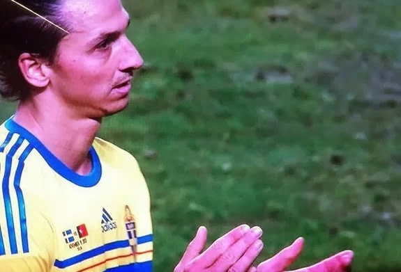 Zlatan Ibrahimović is pictured clapping following Cristiano Ronaldo's third goal against Sweden