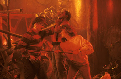 A Nightmare on Elm Street 3: Dream Warriors movie still where three kids try to kill Robert Englund's Freddy Kruger