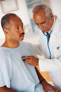 black_man_receiving_a_physical_examination.jpg