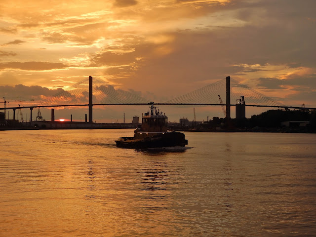 sunset and tug boat