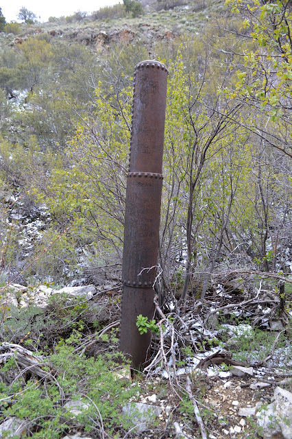 rivetted heavy pipe tower