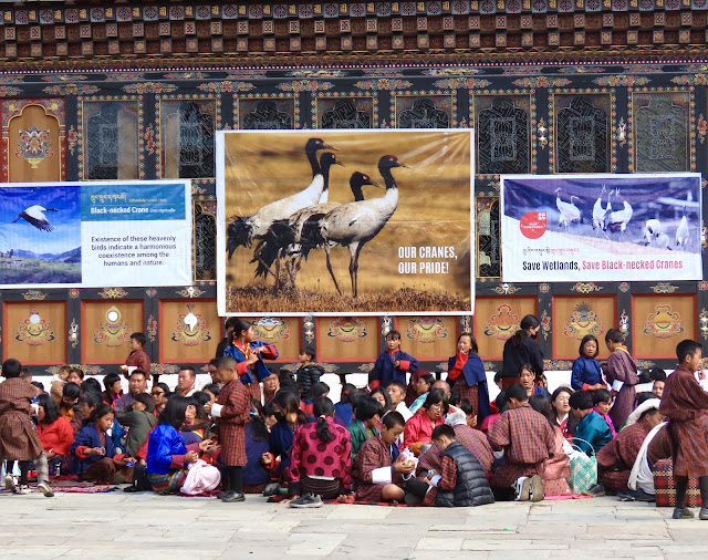 Local families during the lunch break at the Black-necked Crane Festival 2023 in the Gangtey Monastery, Bhutan.