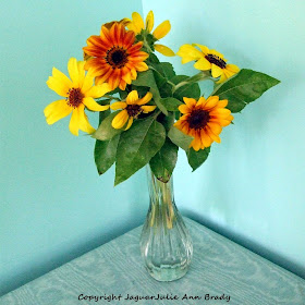 Sunflowers in a Glass Bud Vase