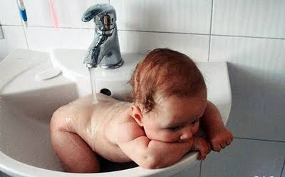 cute-baby-bathing-in-sink-funny