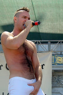 Hunk with Mohawk singing