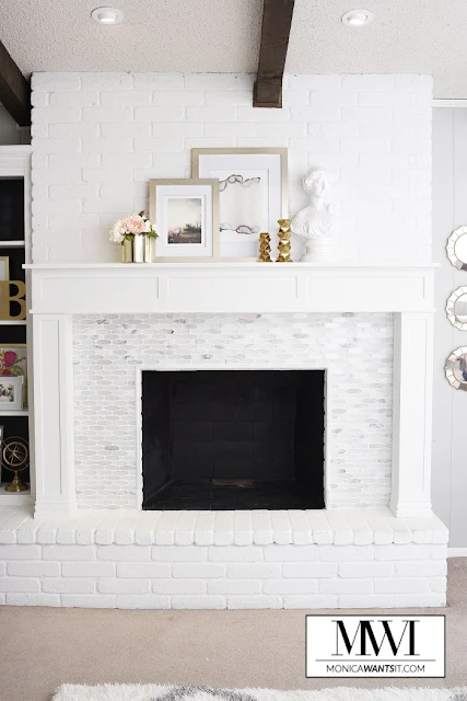 bright white fireplace with marble