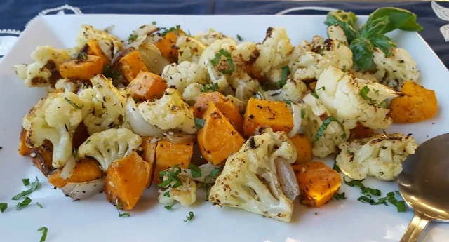 Roasted Cauliflower and Sweet Potatoes with Onion, Garlic and Herbs
