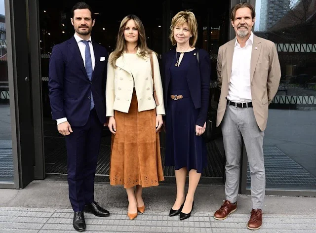 Princess Sofia wore a brown suede pleated midi skirt by &Other Stories, and an ivory wool jacket blazer by Andiata