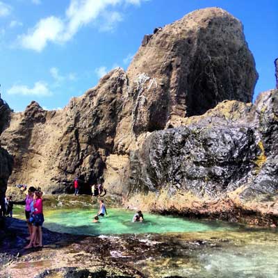 Menikmati Sensasi Air Terjun Asin Di Pantai Nambung