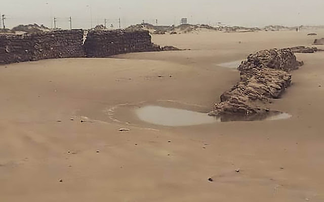 Storm uncovers ancient remains of Roman aqueduct and road in Cádiz