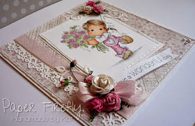 Pink and girly card featuring Tilda with flowers, and pearl, flower and ribbon details