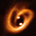 Como un pretzel cósmico, ALMA observa dos estrellas gemelas jóvenes