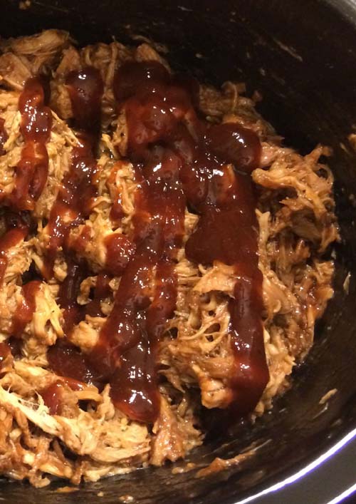 Shredded Root Beer Pulled Pork with added BBQ Sauce for a lil bit more slow cooking